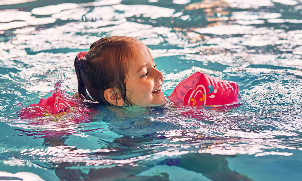 Little happy smiling girl playing in water in pool 2025 03 08 06 01 41 utc WEB